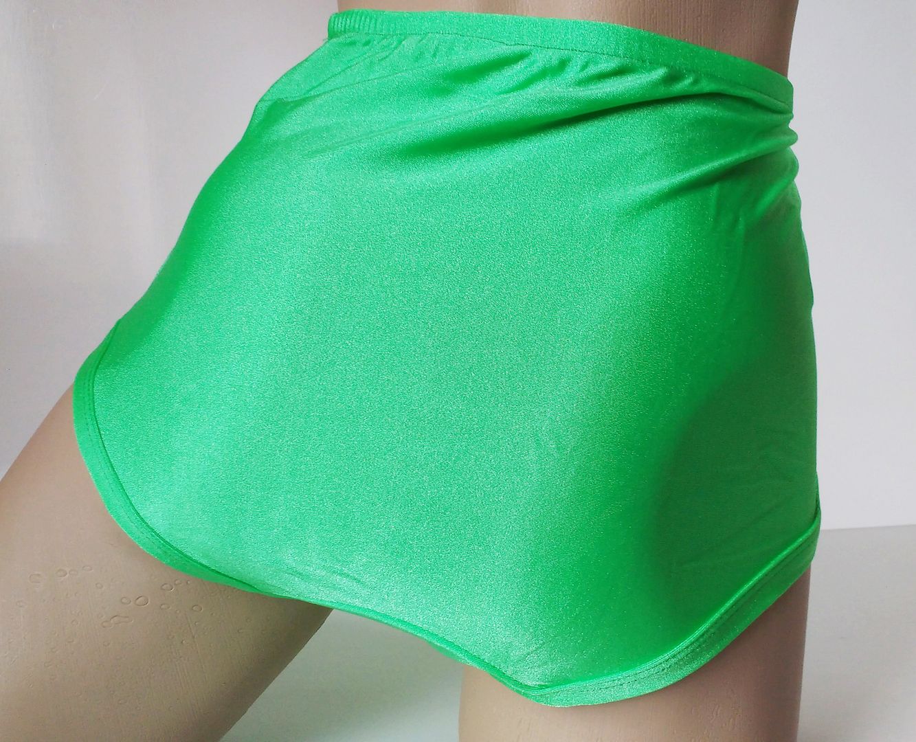 green nylon pants